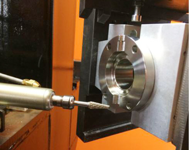 Robot Automatic Workpiece -guided deburring